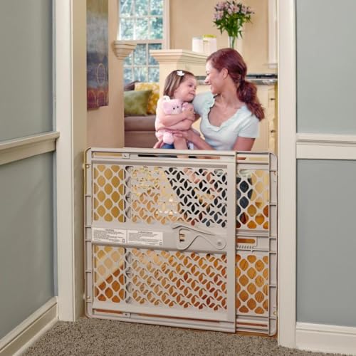 Toddleroo by North States Supergate Ergo Child Gate, Baby Gate for Stairs and Doorways. Includes Wall Cups. Pressure or Hardware Mount. Made in USA. (26' Tall, Sand)